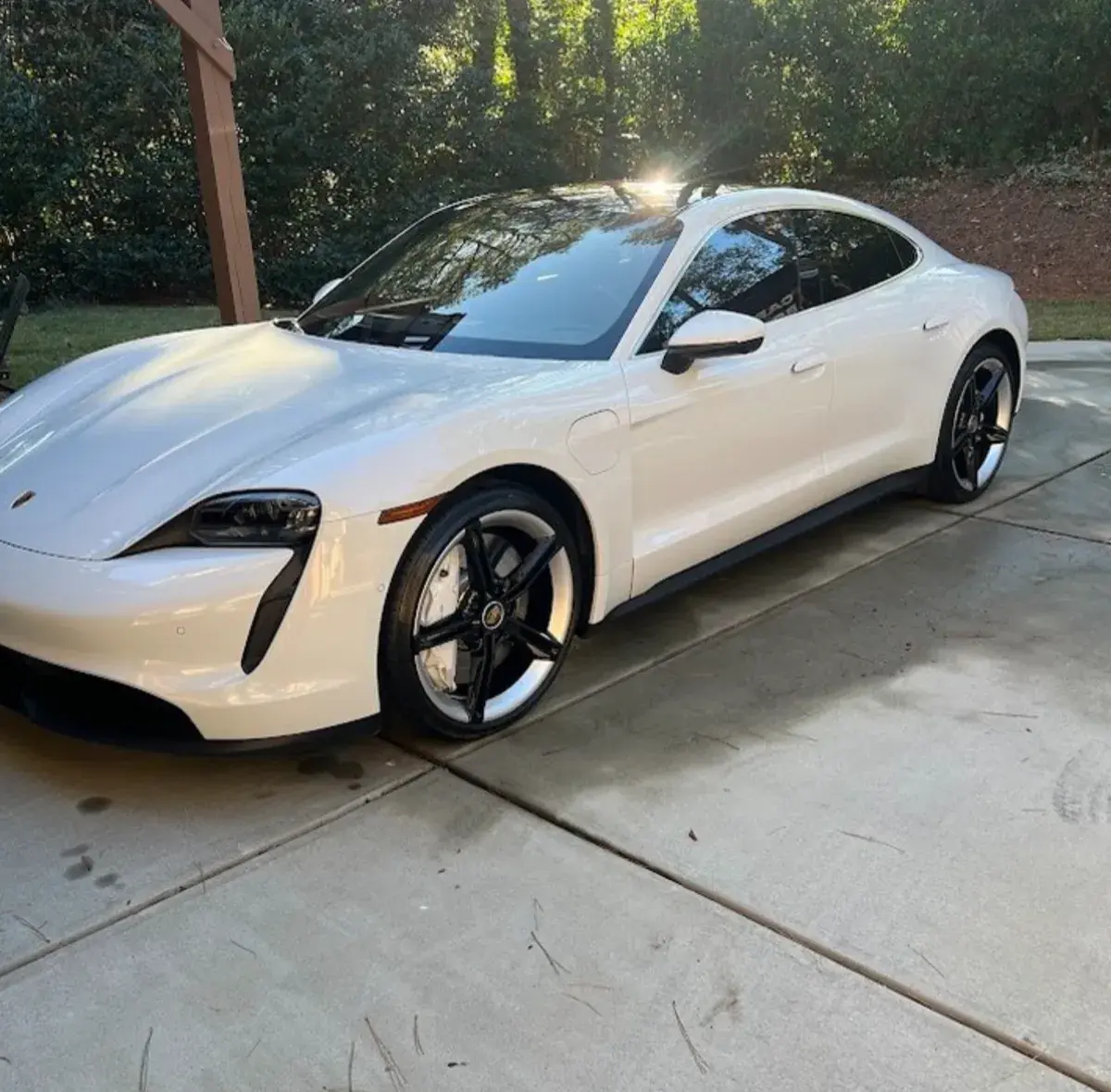 White Porsche Taycan with flawless exterior detail in Atlanta GA